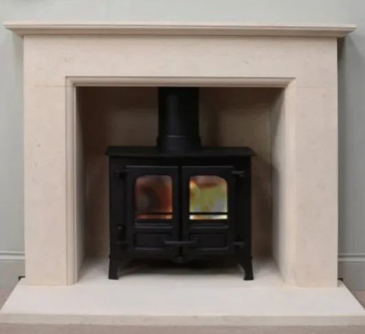 Hand carved limestone fireplace