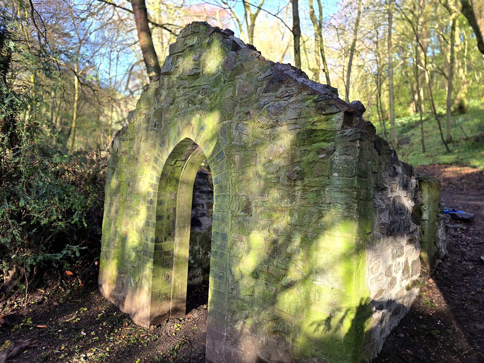 The rebuilt side walls of the Pump House in Rectory Wood, Church Stretton