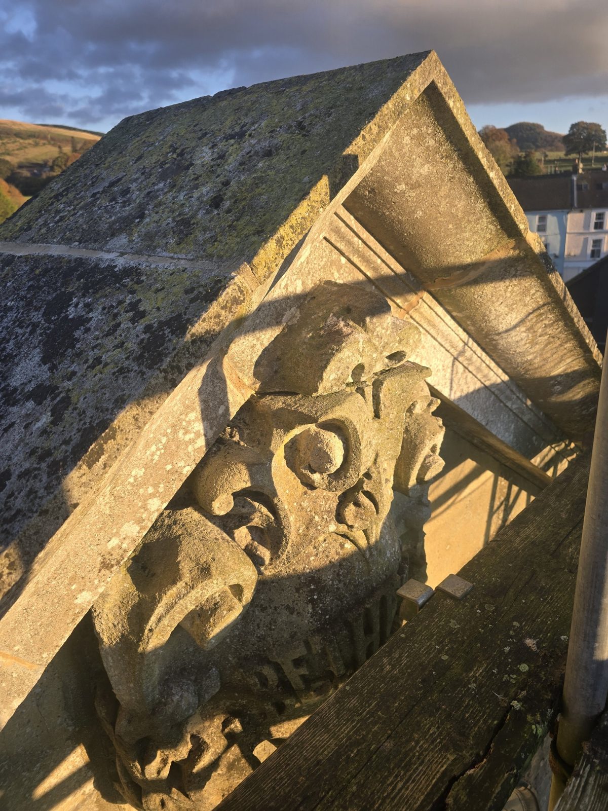 Weathered carving before repair